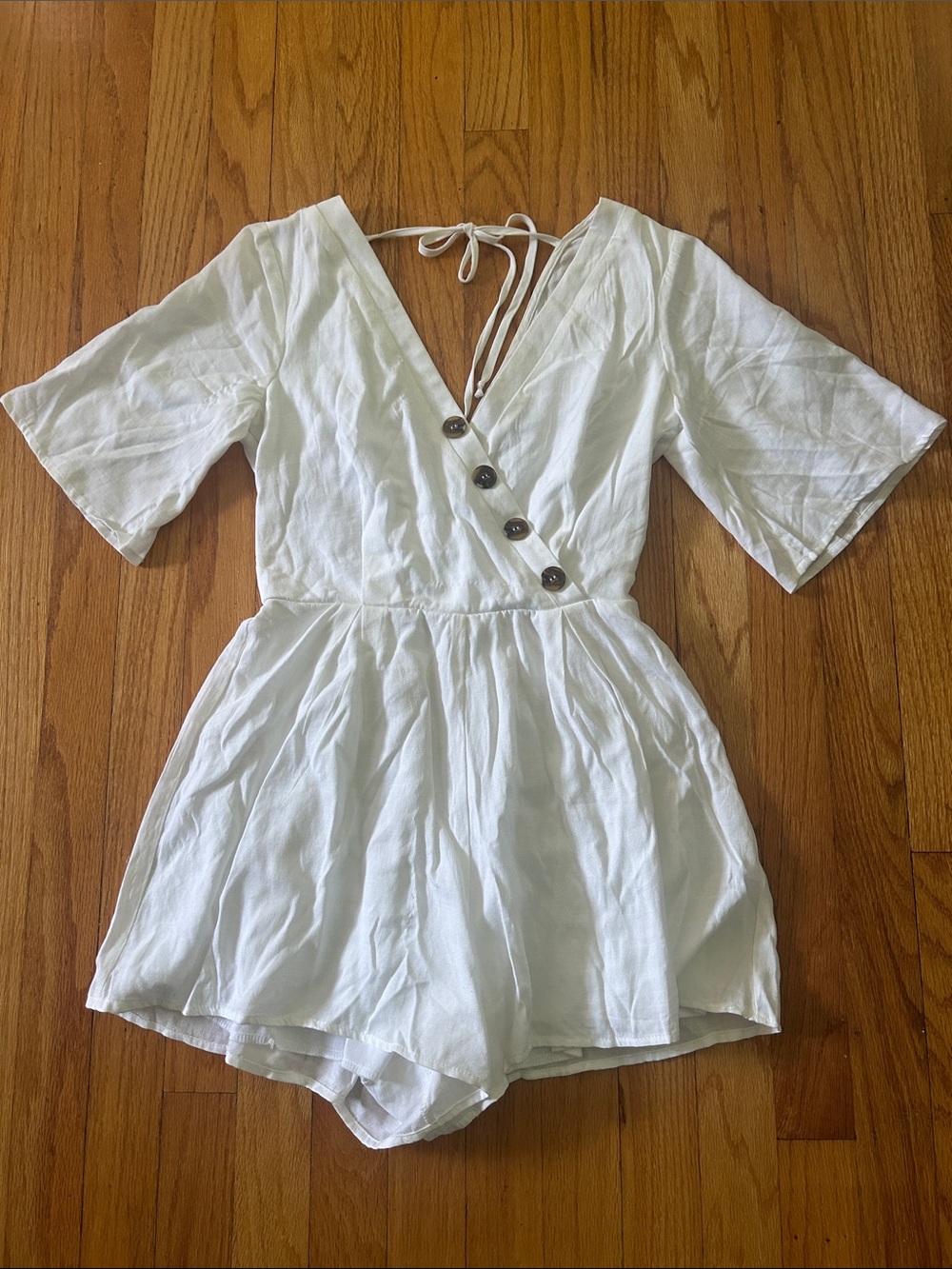 Blue Rain/Francesca’s White V-Neck Button Front Romper